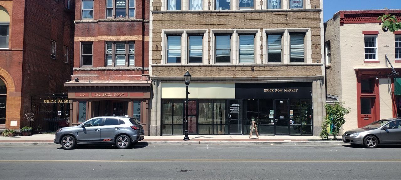 Brick Row Market storefront on N. Division Street